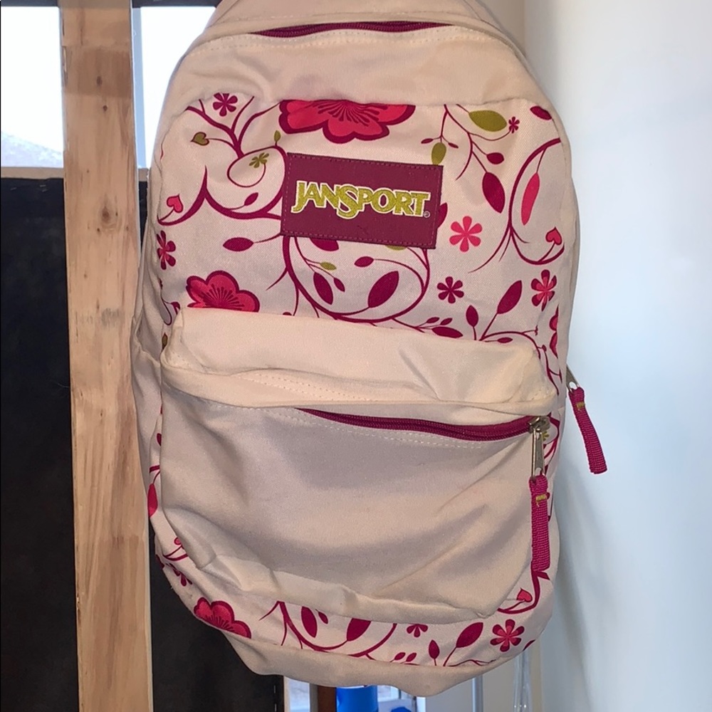 Floral pink and white JanSport backpack